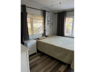 This home is located in a 55+ Community.   Situated on the Chain - photo 5