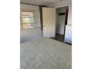 This home is located in a 55+ Community.   Situated on the Chain - photo 6