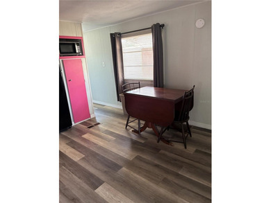 This home is located in a 55+ Community.   Situated on the Chain - photo 9