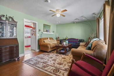 Charming 4-bedroom home situated on a spacious corner lot shaded - photo 4
