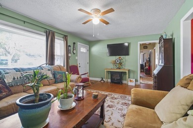 Charming 4-bedroom home situated on a spacious corner lot shaded - photo 5