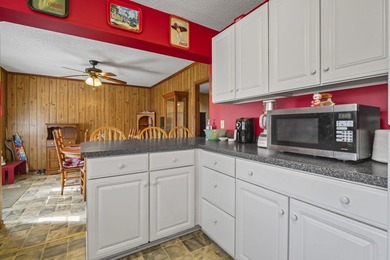 Charming 4-bedroom home situated on a spacious corner lot shaded - photo 9