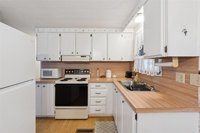 Welcome to this charming and well-maintained 2 bedroom, 2 - photo 9