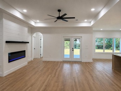 Welcome to 8756 Sand Pine Drive--a truly rare new-construction - photo 6