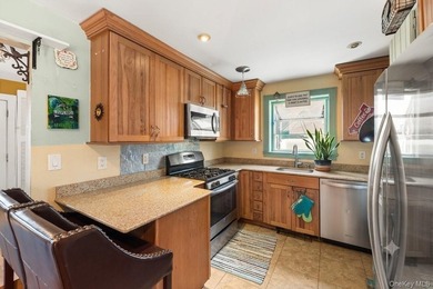 Welcome to 23 Dewey Place in Lindenhurst! This charming - photo 7
