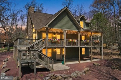 Set within Lake Harmony Estates, 12 Lupine Drive is designed - photo 1