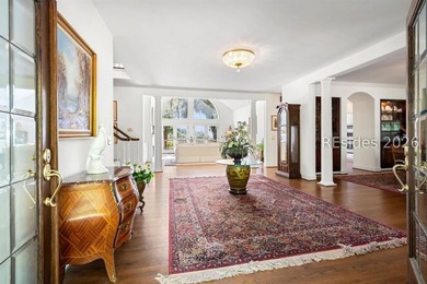 Set against a breathtaking Lowcountry backdrop, this stately - photo 7