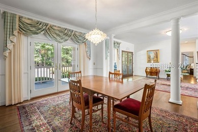 Set against a breathtaking Lowcountry backdrop, this stately - photo 8
