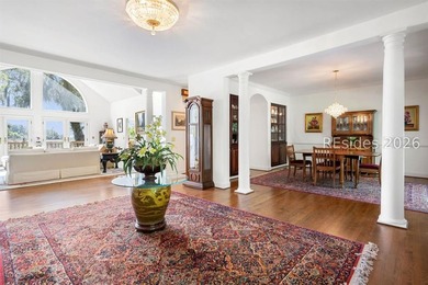 Set against a breathtaking Lowcountry backdrop, this stately - photo 9