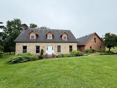 Beautiful lakefront 3 bedroom, 2.5 bath limestone home offering - photo 1