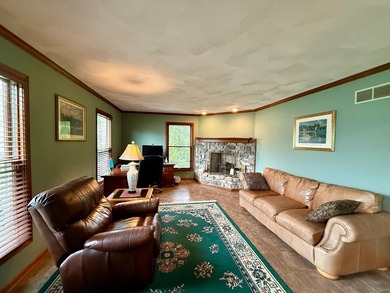 Beautiful lakefront 3 bedroom, 2.5 bath limestone home offering - photo 2