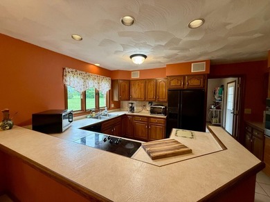 Beautiful lakefront 3 bedroom, 2.5 bath limestone home offering - photo 6