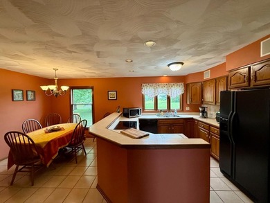 Beautiful lakefront 3 bedroom, 2.5 bath limestone home offering - photo 8