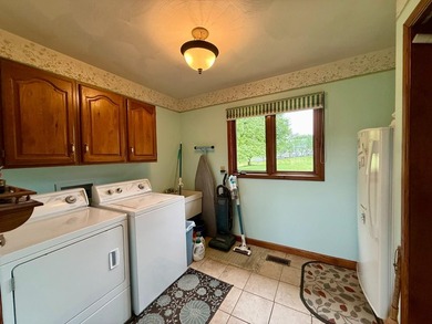 Beautiful lakefront 3 bedroom, 2.5 bath limestone home offering - photo 9