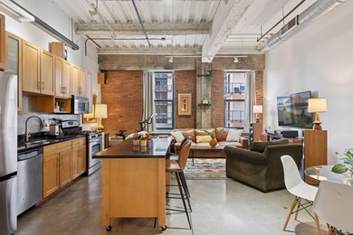 Welcome to this stunning one bedroom + den condo at the historic - photo 1
