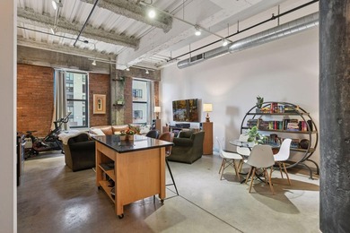 Welcome to this stunning one bedroom + den condo at the historic - photo 2