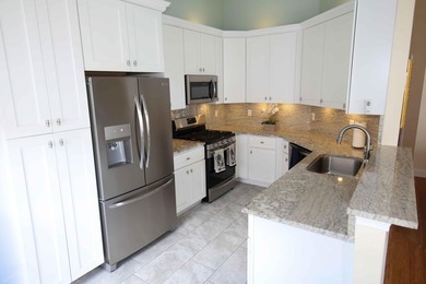 You'll fall in love with this beautifully updated lakefront home - photo 11
