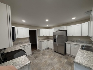 Step into this beautifully remodeled home, upgraded from the - photo 4