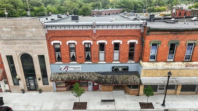 106 Locust Street offers strong potential for upper-level - photo 4