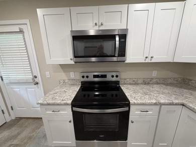 Step into this beautifully remodeled home, upgraded from the - photo 6