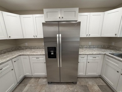 Step into this beautifully remodeled home, upgraded from the - photo 8