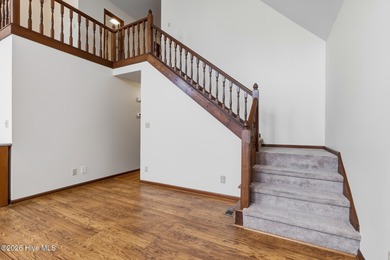 Exceptional Waterfront Retreat in beautiful Lake Royale! This