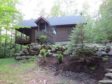 Escape to the beauty and tranquility of the Adirondacks in this - photo 2