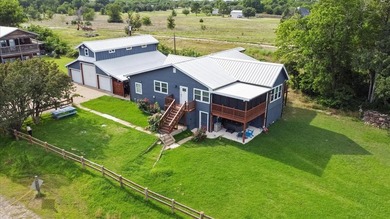 Welcome to the Reel Lazy Lake House, a fully furnished - photo 3