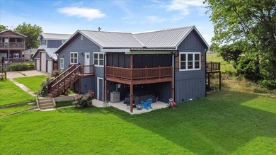 Welcome to the Reel Lazy Lake House, a fully furnished - photo 5