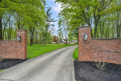 Nestled on a breathtaking wooded lot on the - photo 2