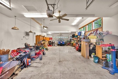 Nestled on a breathtaking wooded lot on the - photo 7
