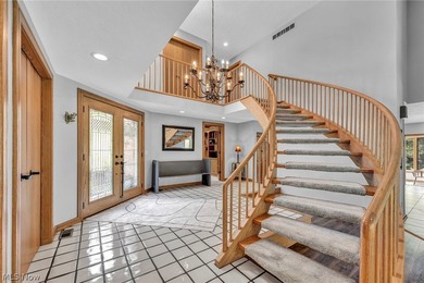 Nestled on a breathtaking wooded lot on the - photo 8