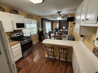 This super meticulous 3 bedroom 1 bath ranch style home with a - photo 3