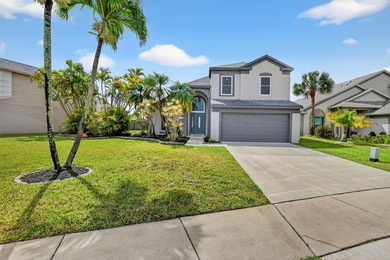Welcome to this beautifully updated home located in the highly - photo 1
