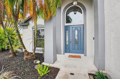 Welcome to this beautifully updated home located in the highly - photo 3