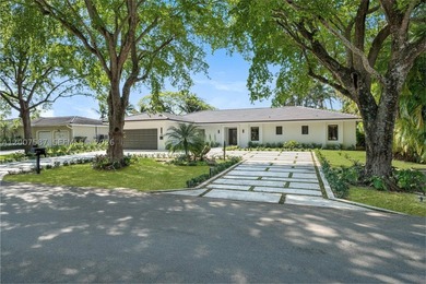 Located in Gables by the Sea, this fully renovated waterfront - photo 2