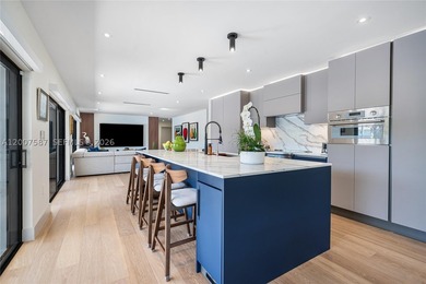 Located in Gables by the Sea, this fully renovated waterfront - photo 5