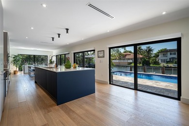 Located in Gables by the Sea, this fully renovated waterfront - photo 6
