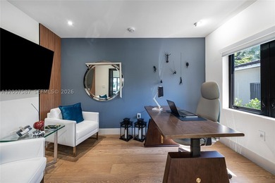 Located in Gables by the Sea, this fully renovated waterfront - photo 9