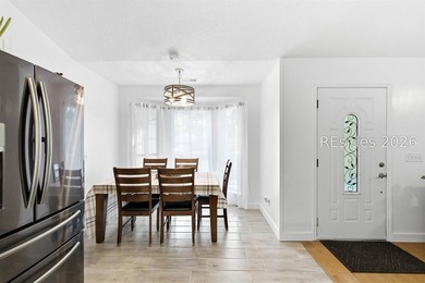 NO HOA! Spacious and inviting 4-bedroom, 2-bath brick home - photo 7