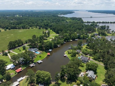 Experience luxury lake living at its finest with this stunning - photo 2
