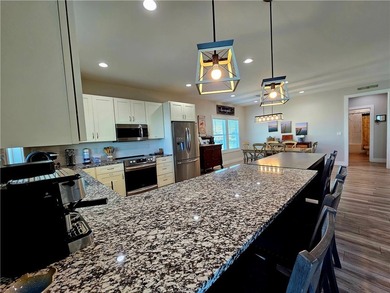 Welcome to 122 Ridge Harbor, where quality and luxury meet the - photo 17