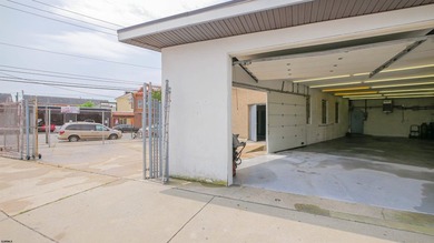 The property includes a spacious building, featuring both - photo 1