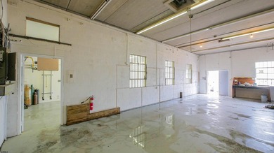 The property includes a spacious building, featuring both - photo 7
