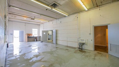 The property includes a spacious building, featuring both - photo 8
