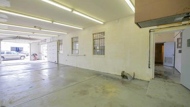 The property includes a spacious building, featuring both - photo 10