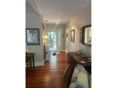 This charming two-bedroom, two-bathroom home is nestled in the - photo 4