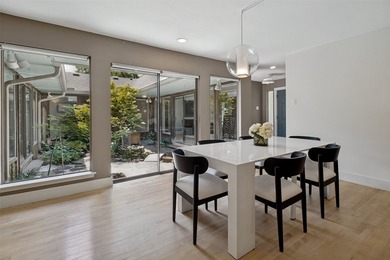 Steps from Prairie Creek, this beautifully renovated 4-bed - photo 8