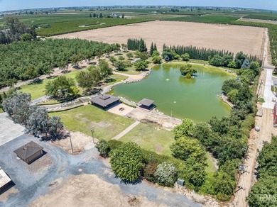 Discover an extraordinary 30-acre estate in the heart of - photo 2