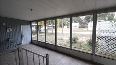 Welcome to 1158 CR 439 in Lake Panasoffkee, a property that - photo 3